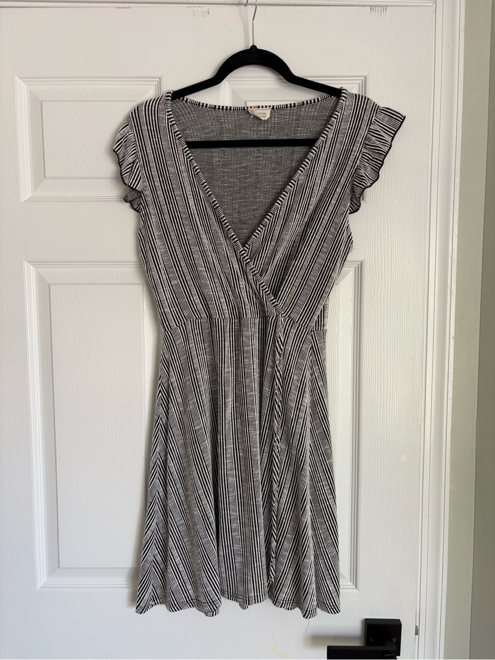 Striped V‑Neck Fit & Flare Dress in Black and White